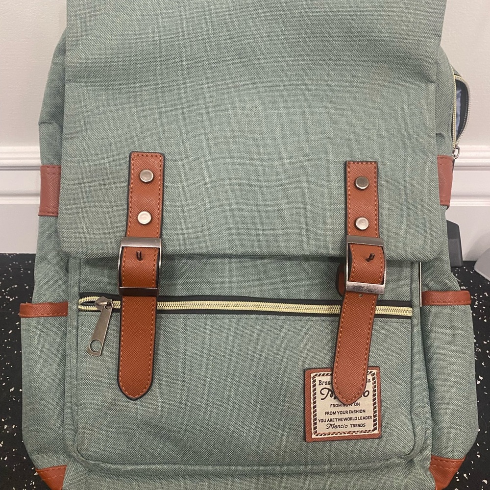 Stylish Green Backpack with Brown Accents